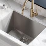 Sinks contribute to kitchen efficiency by playing a central role in kitchen design